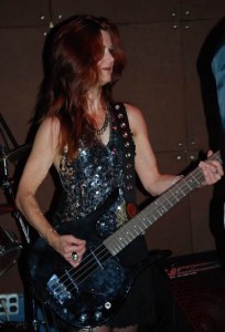 Barbara playing bass with the Fags 2009